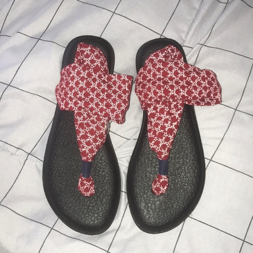 • red and white sanuk sandals •